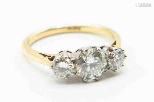 AN 18CT YELLOW GOLD AND DIAMOND RING, the three