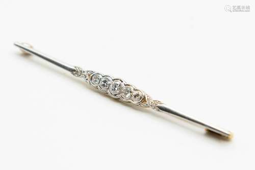 A DIAMOND SET BAR BROOCH, circa 1890-1900, the five