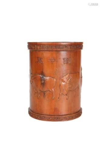 A CHINESE HARDWOOD BRUSHPOT, carved with bison and