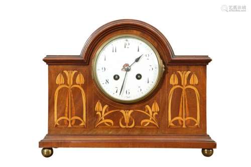 AN ART NOUVEAU INLAID MAHOGANY MANTEL CLOCK, IN THE