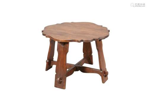 AN ARTS AND CRAFTS OAK OCCASIONAL TABLE, with shaped