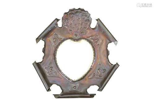 AN ARTS AND CRAFTS COPPER MIRROR, with shield-shaped