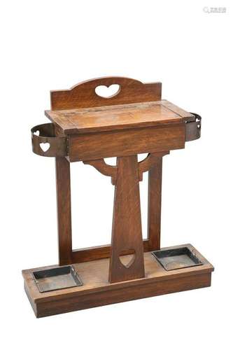 AN ARTS AND CRAFTS OAK STICKSTAND, ATTRIBUTED TO