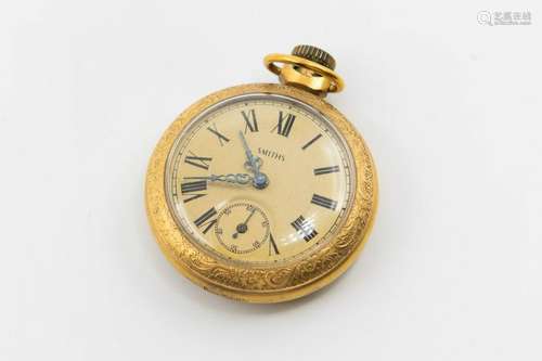 A GILT METAL SMITHS POCKET WATCH. Circular champagne