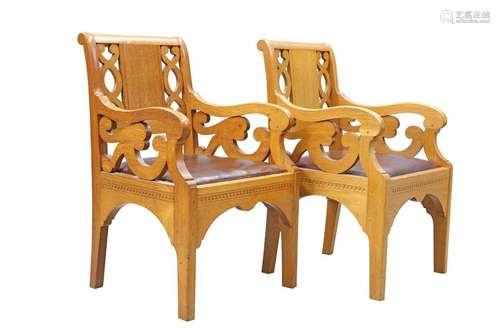 A PAIR OF GOLDEN OAK ARMCHAIRS, POSSIBLY BY ARTHUR