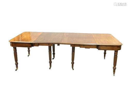 A REGENCY MAHOGANY TELESCOPIC ACTION DINING TABLE, IN