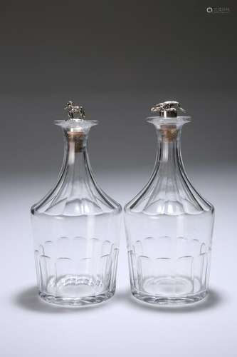 A PAIR OF REGENCY CUT-GLASS DECANTERS, with partially