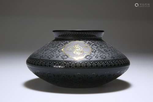 A MIDDLE EASTERN ACID-ETCHED BLACK GLASS VASE, with