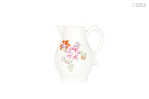 A LOWESTOFT CREAM JUG, c.1775,Â painted with a floral