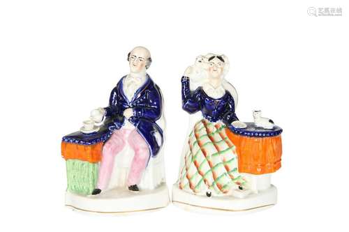 A PAIR OF VICTORIAN STAFFORDSHIRE FIGURES, modelled as