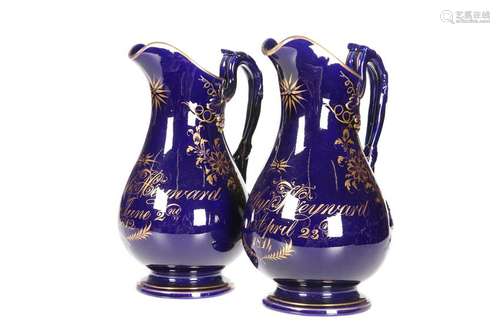 A PAIR OF STAFFORDSHIRE COBALT GROUND JUGS, DATED 1812