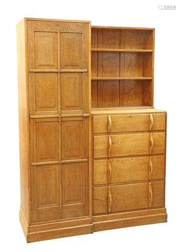 A COTSWOLD SCHOOL OAK COMBINATION WARDROBE, TO A DESIGN