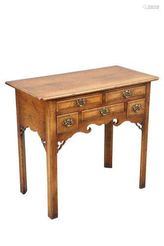 AN 18TH CENTURY STYLE OAK LOWBOY IN THE MANNER OF