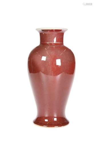 A CHINESE OX BLOOD GLAZED VASE, of baluster form.