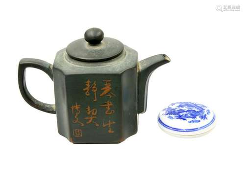 A SMALL CHINESE TEAPOT, with incised character marks,