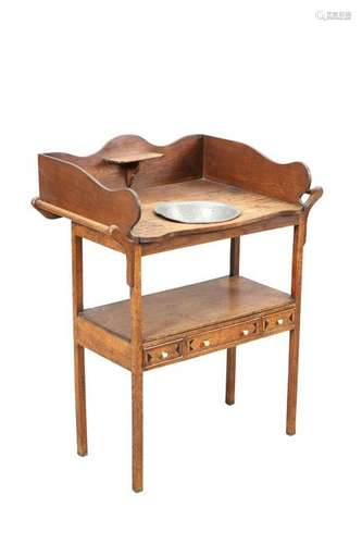 A GEORGE III OAK WASHSTAND, the top with three-quarter