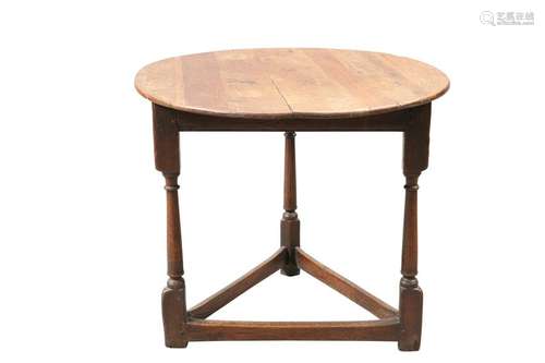 AN 18TH CENTURY OAK CRICKET TABLE, the circular top