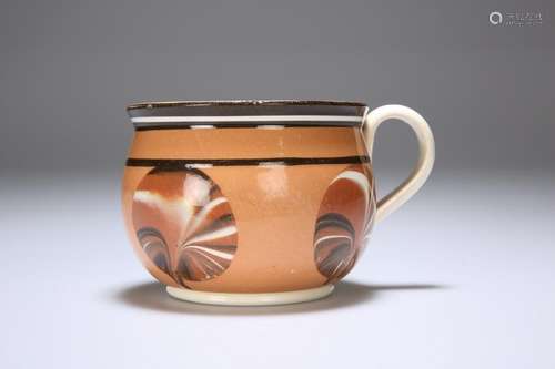 A MOCHA WARE TOBACCO LEAF PATTERN PORRINGER, 19TH