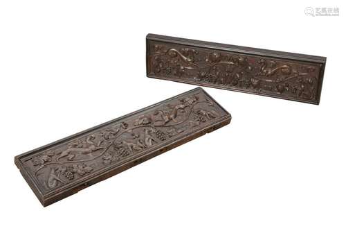 A PAIR OF CARVED OAK OVER DOOR PANELS, PROBABLY MID