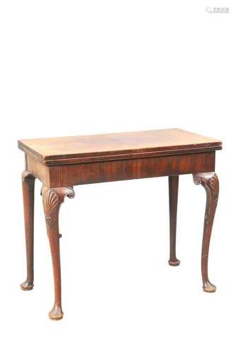 A MID 18TH CENTURY IRISH MAHOGANY FOLDOVER TEA TABLE,