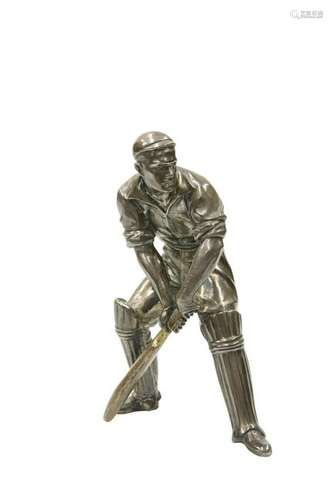 A PATINATED METAL FIGURE OF A CRICKETER AT THE STUMP,