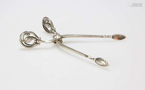 A PAIR OF DANISH SILVER SUGAR TONGS BY GEORG JENSEN,