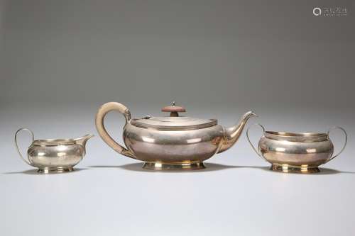 A GEORGE V SILVER THREE-PIECE TEA SERVICE, ADIE