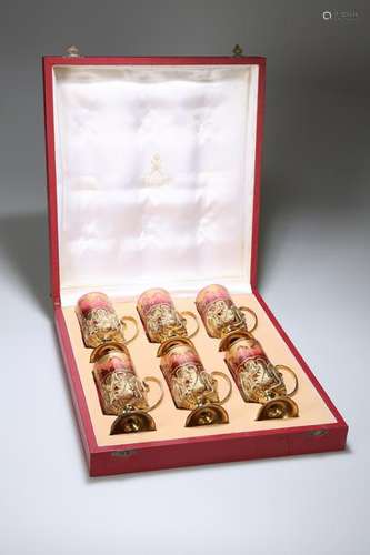 A FINE SET OF SIX SILVER-GILT AND BACCARAT TEA GLASSES,