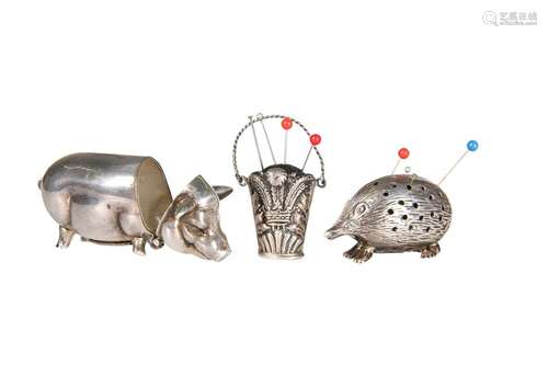 A SILVER VESTA CASE IN THE FORM OF A PIG, hinged at the