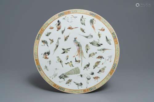 A round Chinese famille rose 'birds' plaque, 19th C.