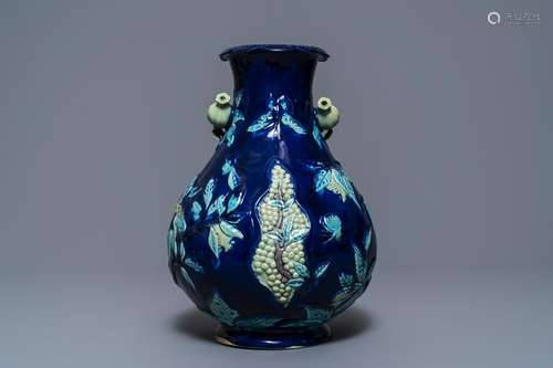 A Chinese fahua relief-decorated vase, 19th C.