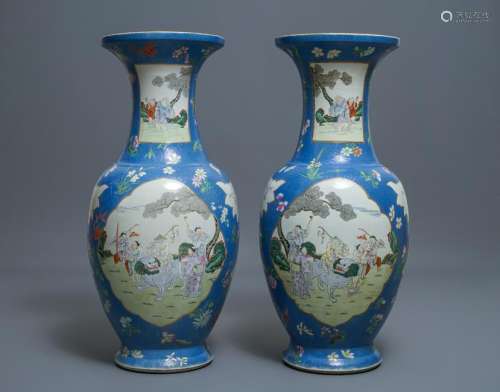 A pair of large Chinese blue-ground famille rose vases