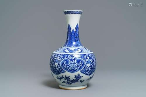 A Chinese blue and white bottle vase with dancers on a