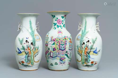A pair of Chinese famille rose vases and one with