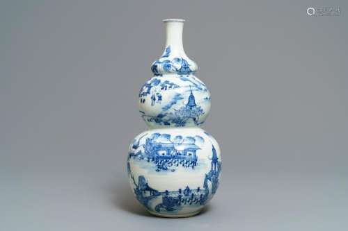 A Chinese blue and white triple gourd vase with