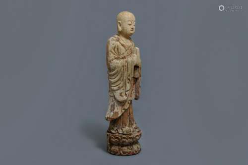 A Chinese painted wood figure of a Buddhist monk, 19th