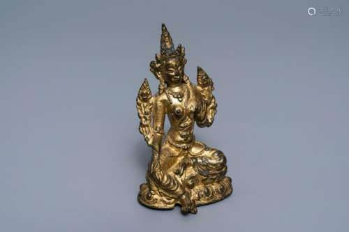 A Sino-Tibetan gilt bronze figure of Green Tara,