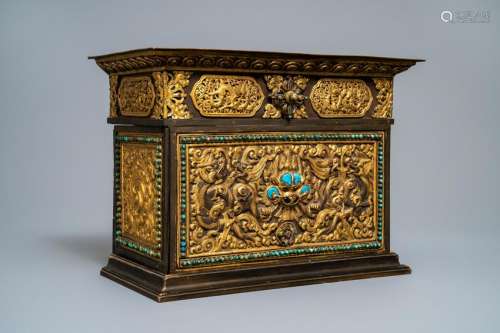 A turquoise-inlaid gilt bronze and copper repoussÃ©