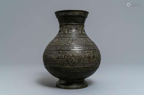 A Chinese archaistic bronze vase, 'hu', Ming