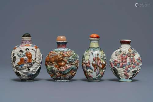 Four Chinese famille rose porcelain relief-decorated