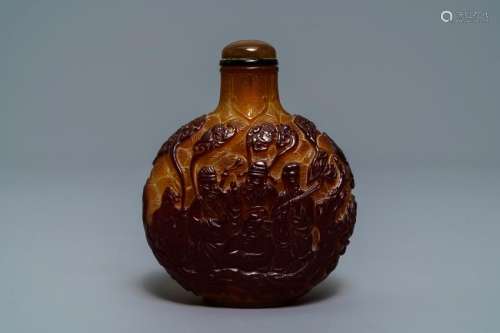 A Chinese table snuff flask with overlay glass design,