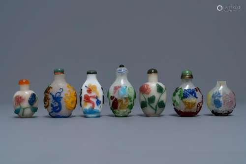 Seven Chinese multi-colour overlay glass snuff bottles,