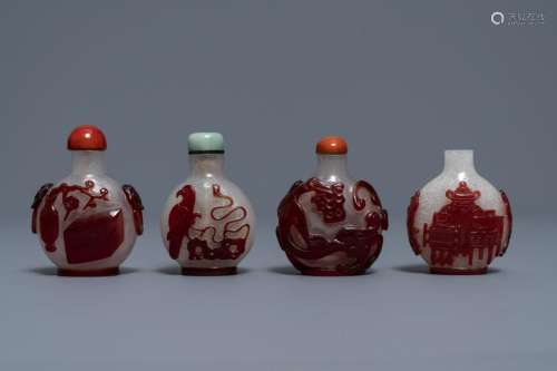 Four Chinese red overlay snowflake glass snuff bottles,