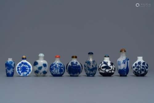 Nine various Chinese blue overlay glass snuff bottles,