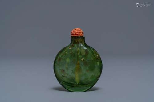 A Chinese biotite-sandwiched green glass snuff bottle,