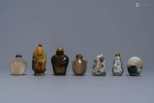 Six Chinese carved agate snuff bottles and a pendant,