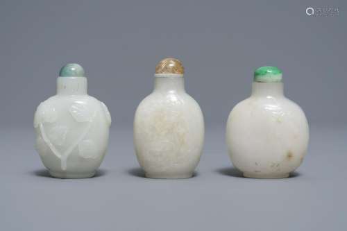 Three Chinese carved pale white jade snuff bottles,