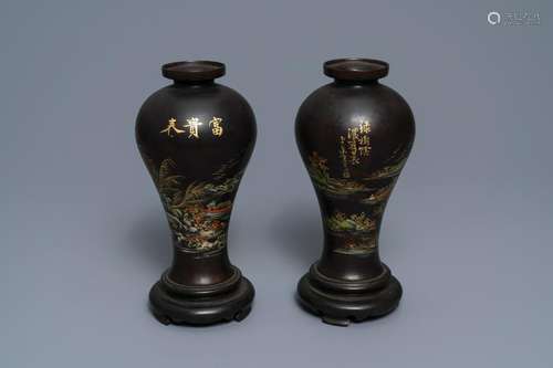 A pair of Chinese lacquerware vases with landscape