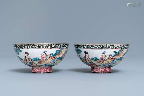 A pair of Chinese Canton enamel bowls with figures in a