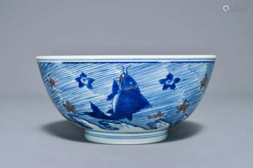 A rare Chinese blue and underglaze red bowl with carps